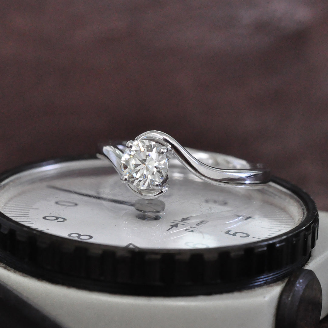 White Diamond twist style Solitaire Ring in White Gold