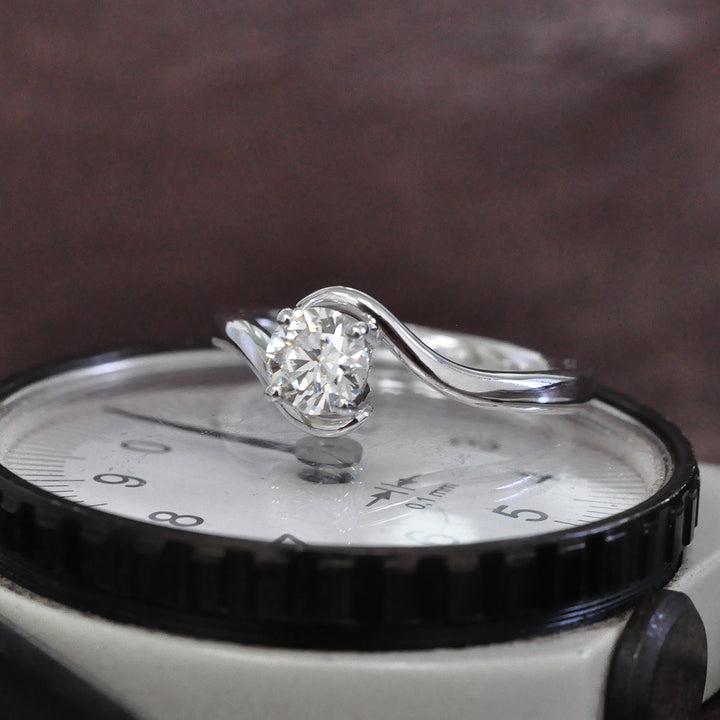 White Diamond twist style Solitaire Ring in White Gold