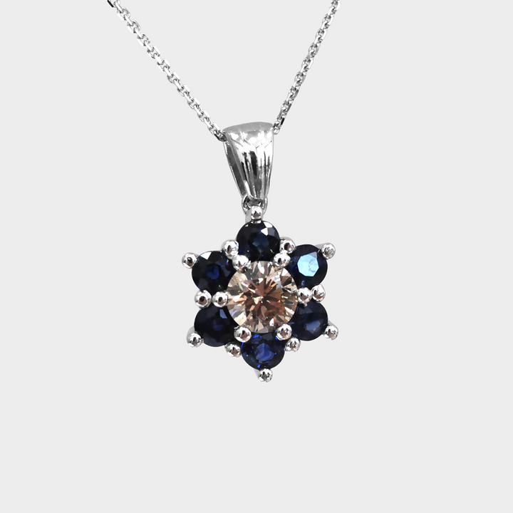 Fancy Brown Diamond and Blue Sapphires Star Pendant Necklace.