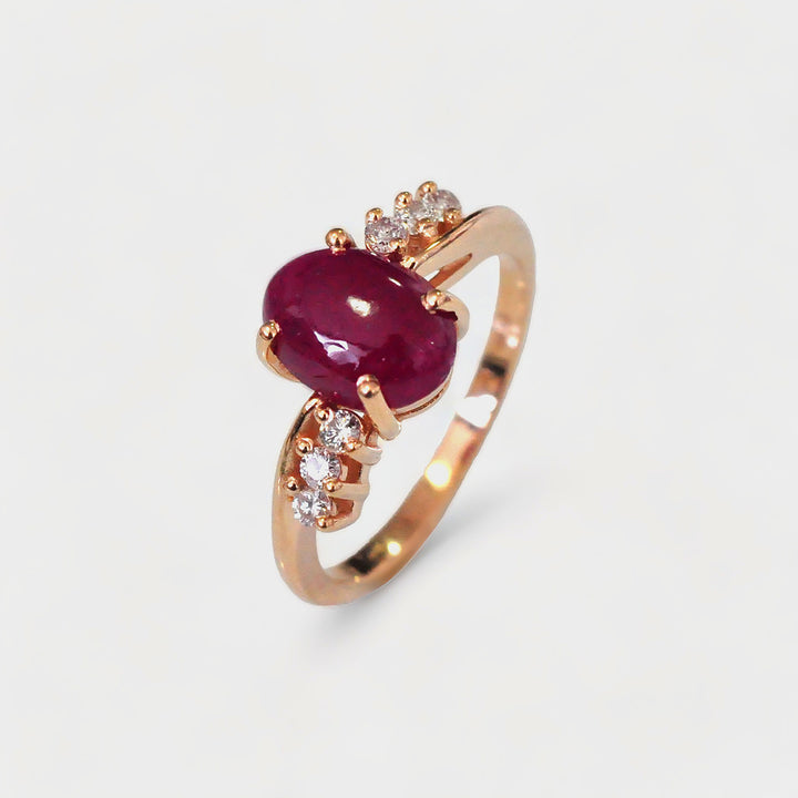Cabochon Ruby and 6 Side Diamonds Ring in Rose Gold