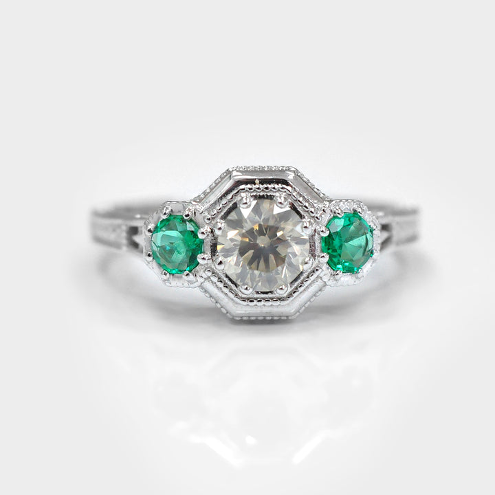 Round Diamond and Pair of Green Emeralds Ring in White Gold