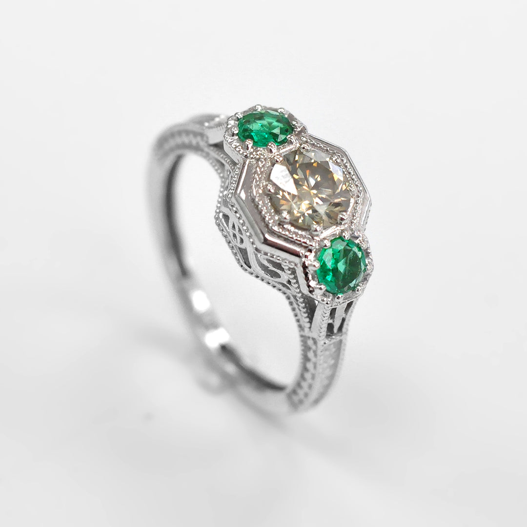 Round Diamond and Pair of Green Emeralds Ring in White Gold
