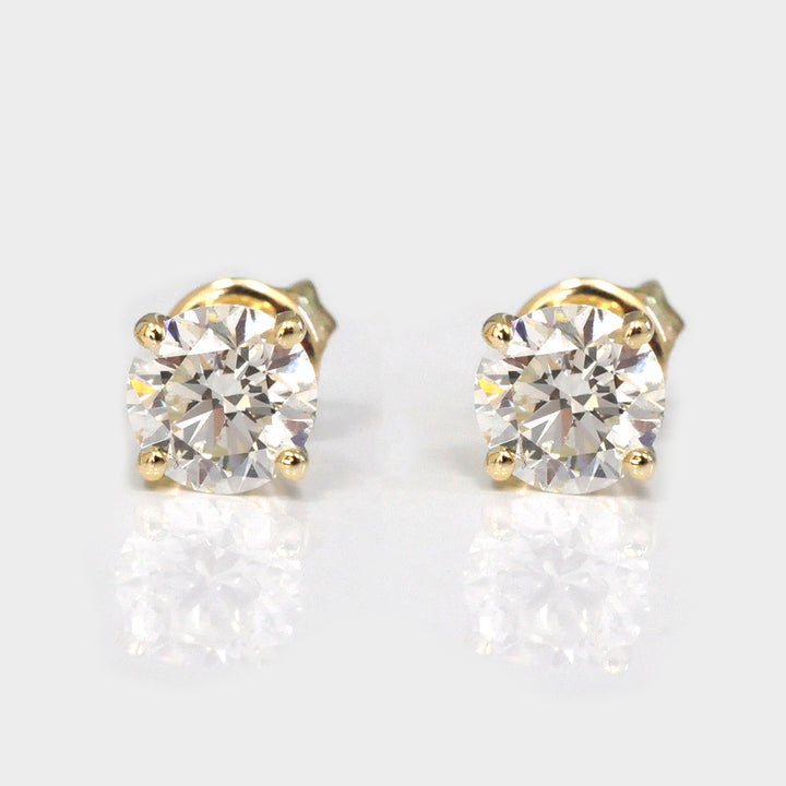 1.5 ct. tw. Yellow gold Diamonds Stud Earrings