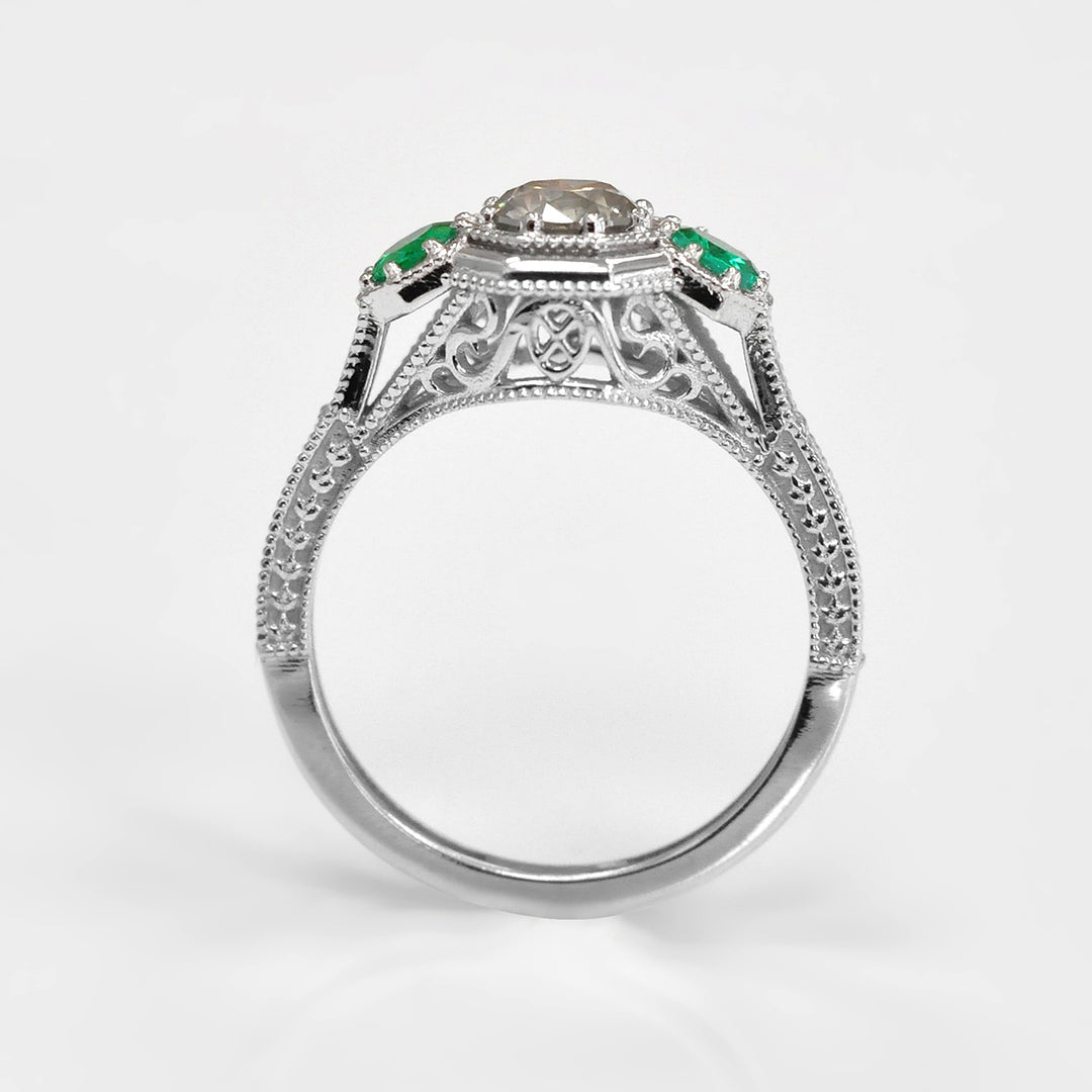 Round Diamond and Pair of Green Emeralds Ring in White Gold