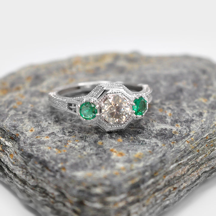 Round Diamond and Pair of Green Emeralds Ring in White Gold