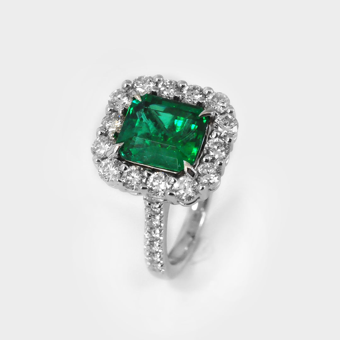 Green Emerald (3 carat) and White Diamonds Halo Ring