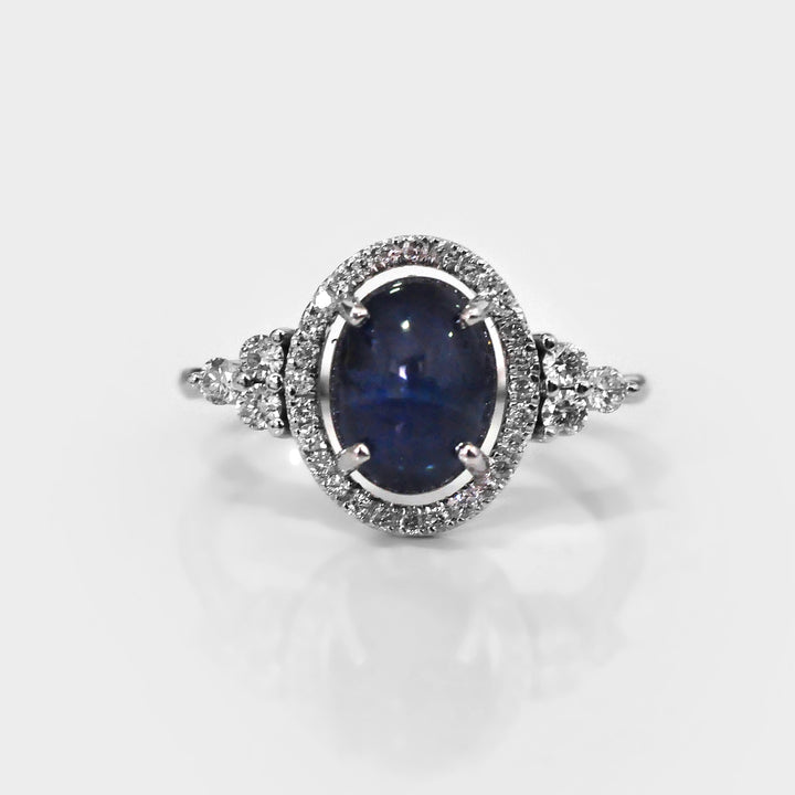 Oval Cabochon Sapphire Halo Diamonds Ring