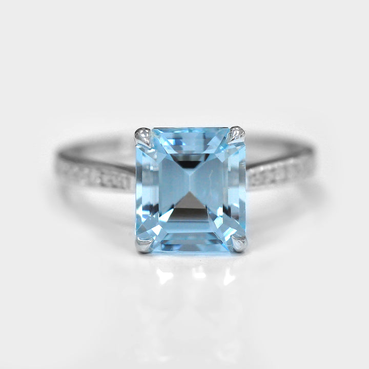 Light Blue Aquamarine and Side Diamonds Ring