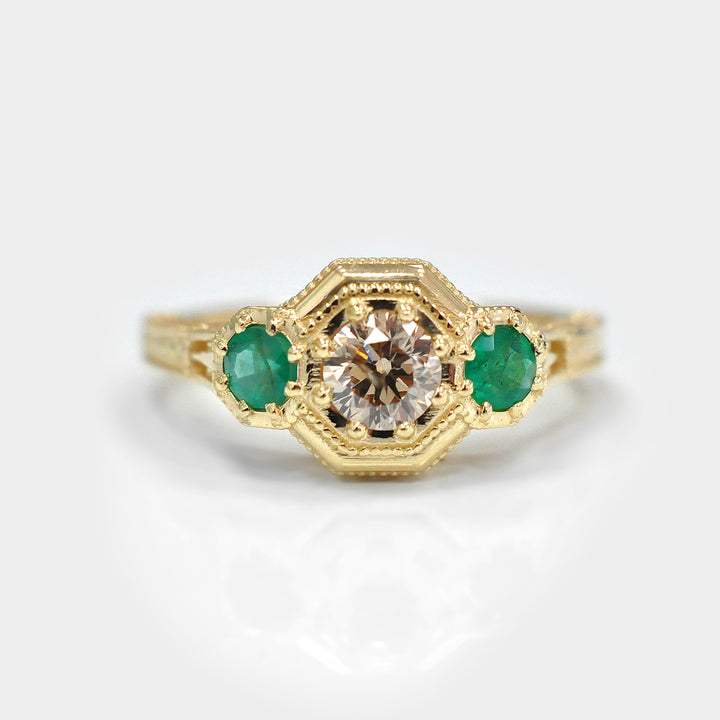 Round Diamond and Green Emeralds 3 Stones Ring in Yellow Gold