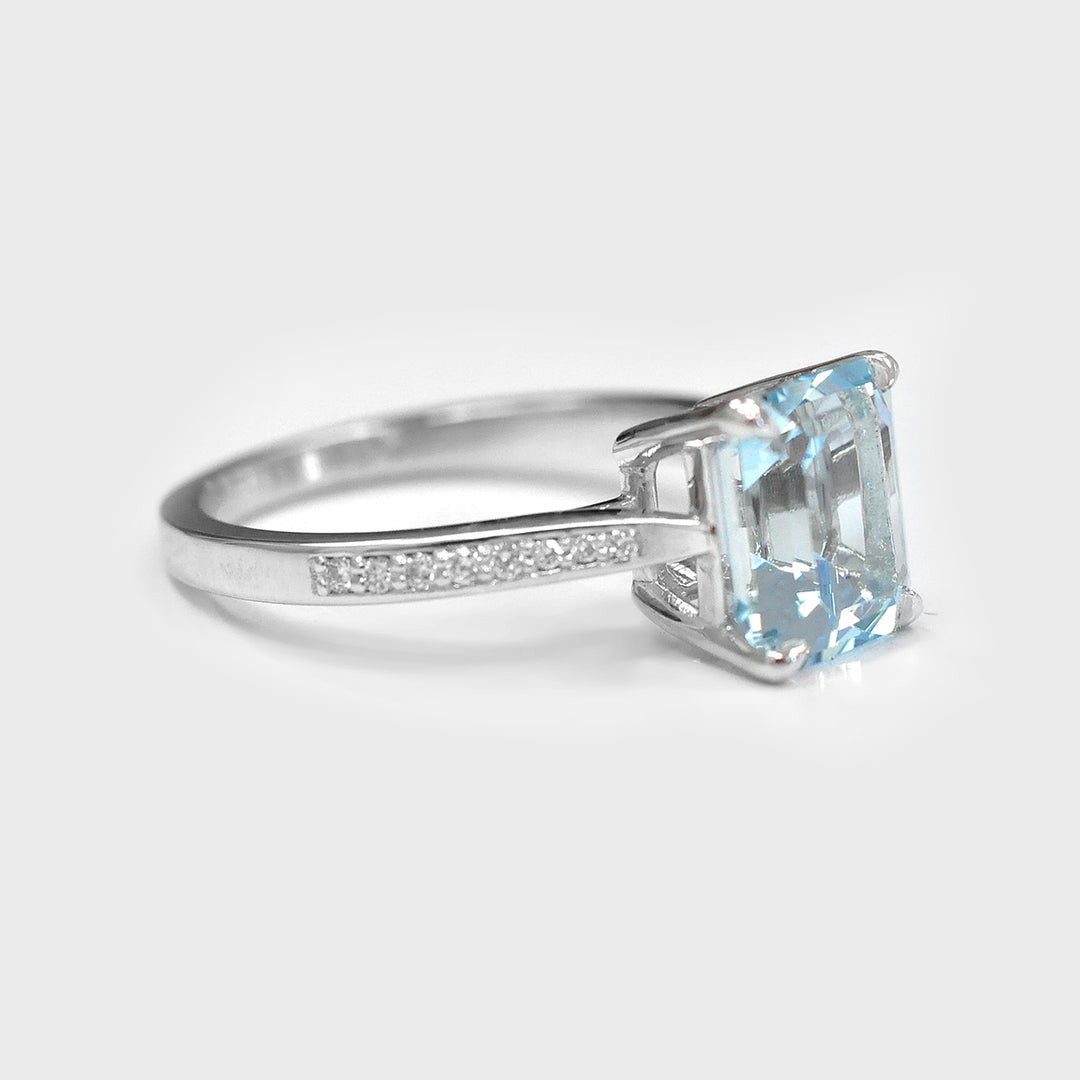 Light Blue Aquamarine and Side Diamonds Ring