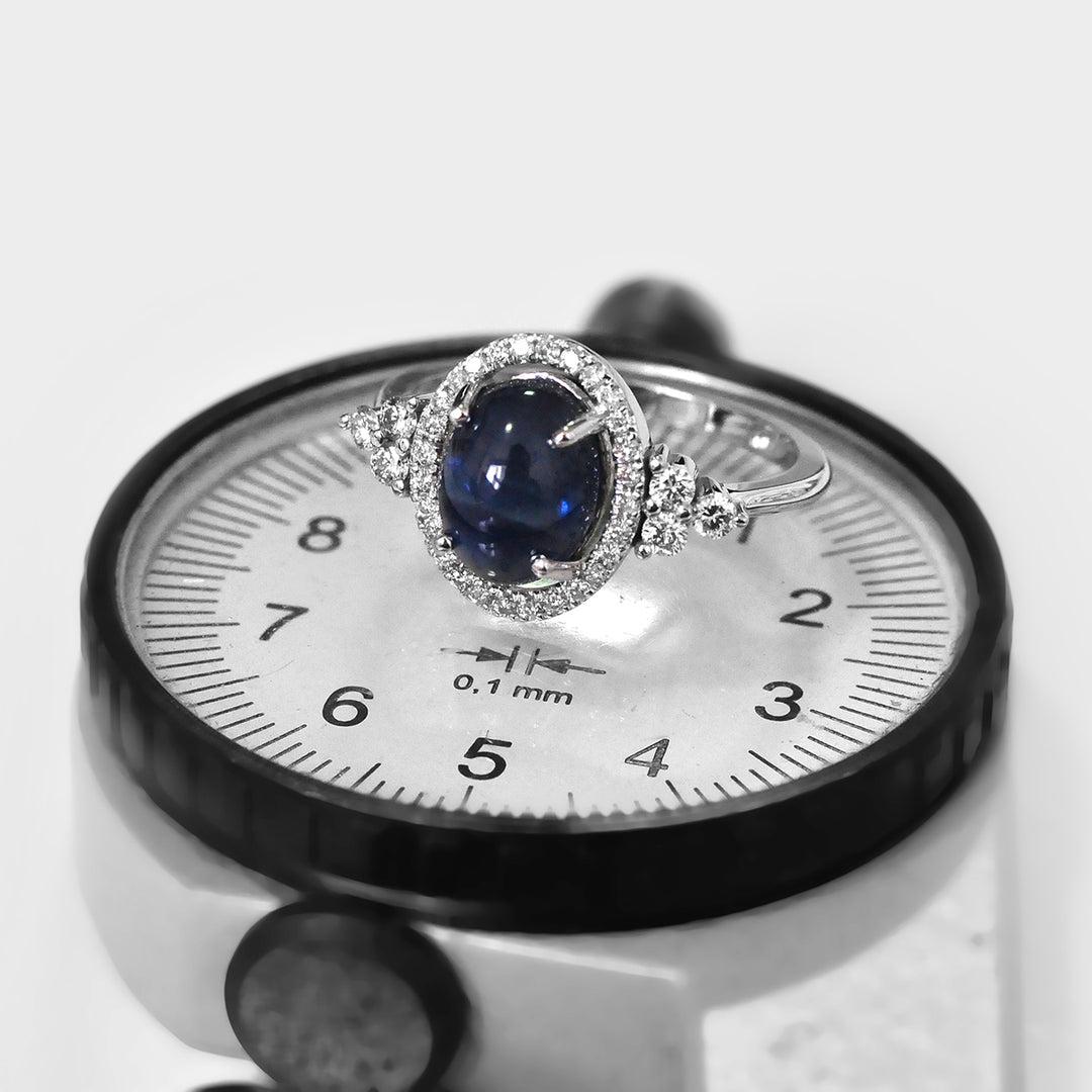 Oval Cabochon Sapphire Halo Diamonds Ring
