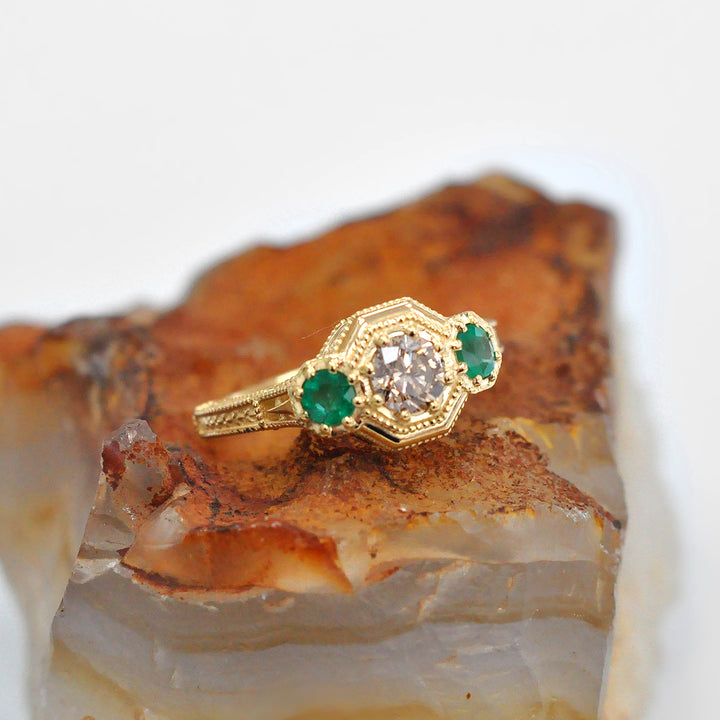 Round Diamond and Green Emeralds 3 Stones Ring in Yellow Gold