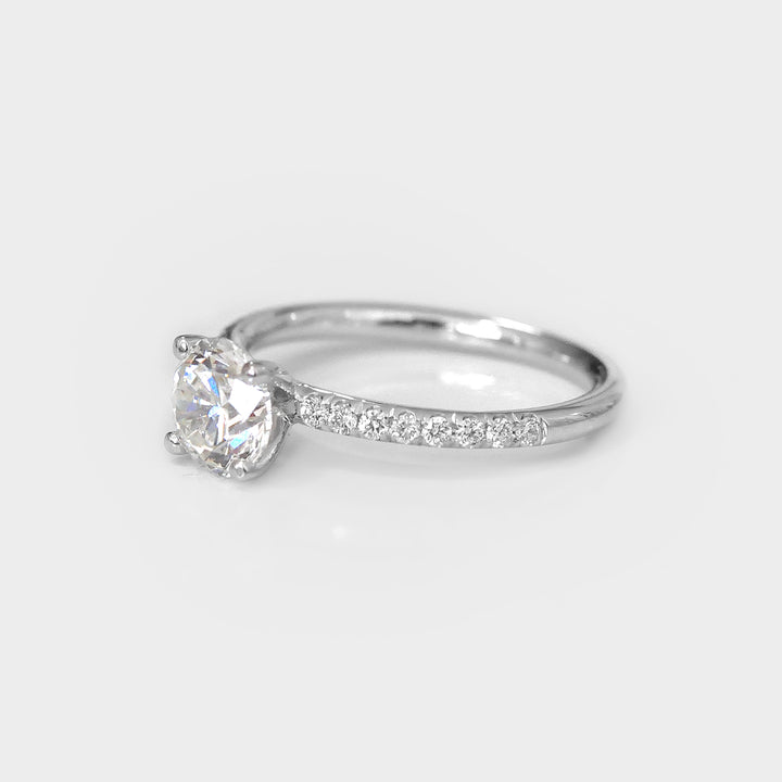 White Round Diamond Classic Martini Ring withSide Diamonds.