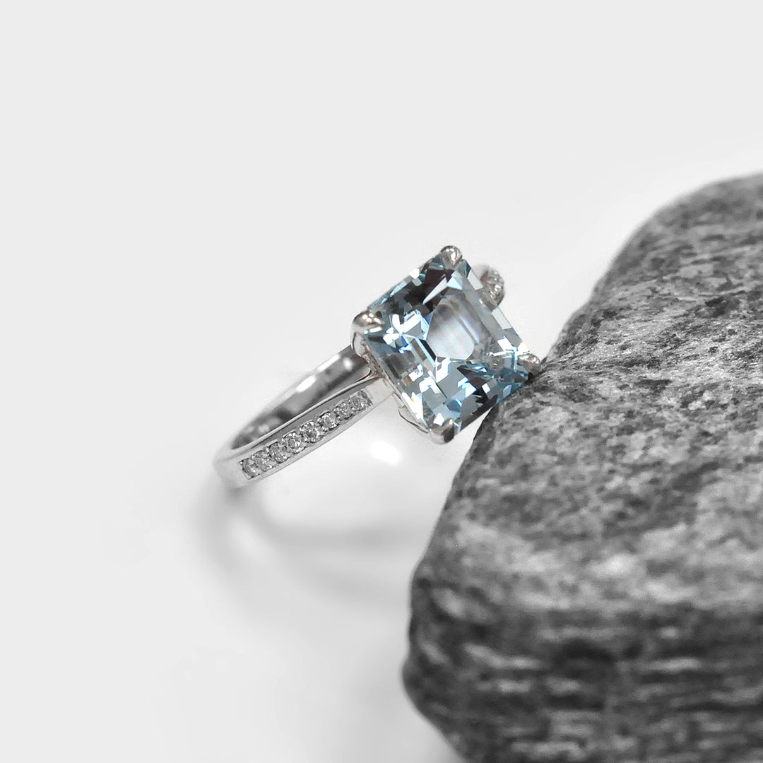 Light Blue Aquamarine and Side Diamonds Ring