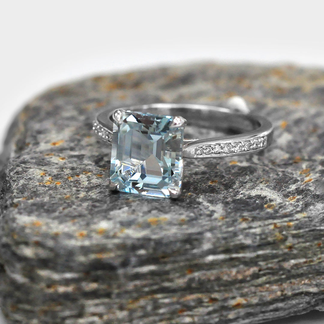 Light Blue Aquamarine and Side Diamonds Ring