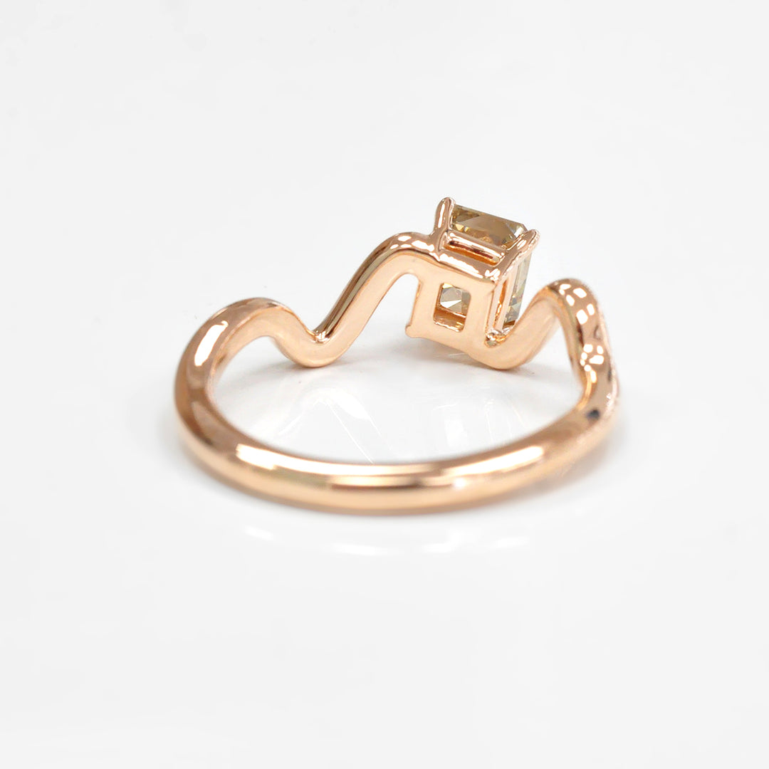 Rose gold twisted shank diamond engagement ring
