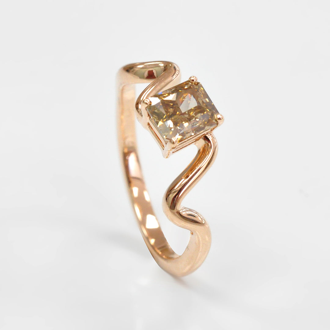 Rose gold twisted shank diamond engagement ring