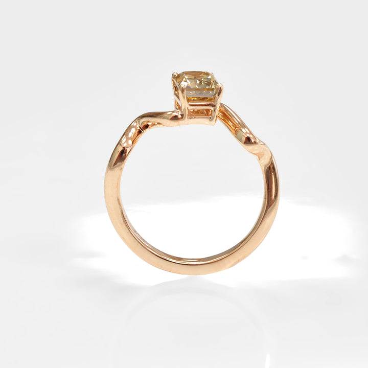 Rose gold twisted shank diamond engagement ring