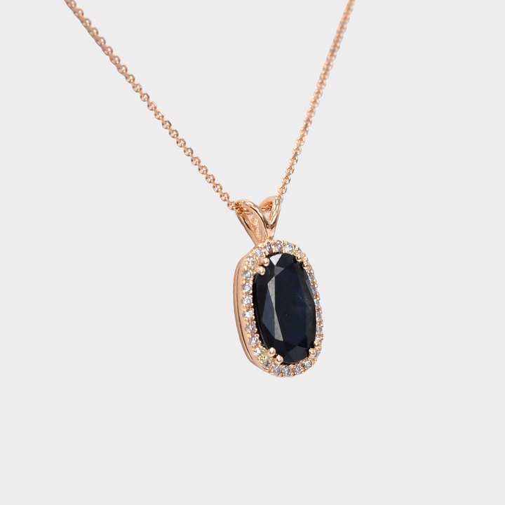Oval Shape Sapphire and Halo Diamonds Pendant in Rose Gold