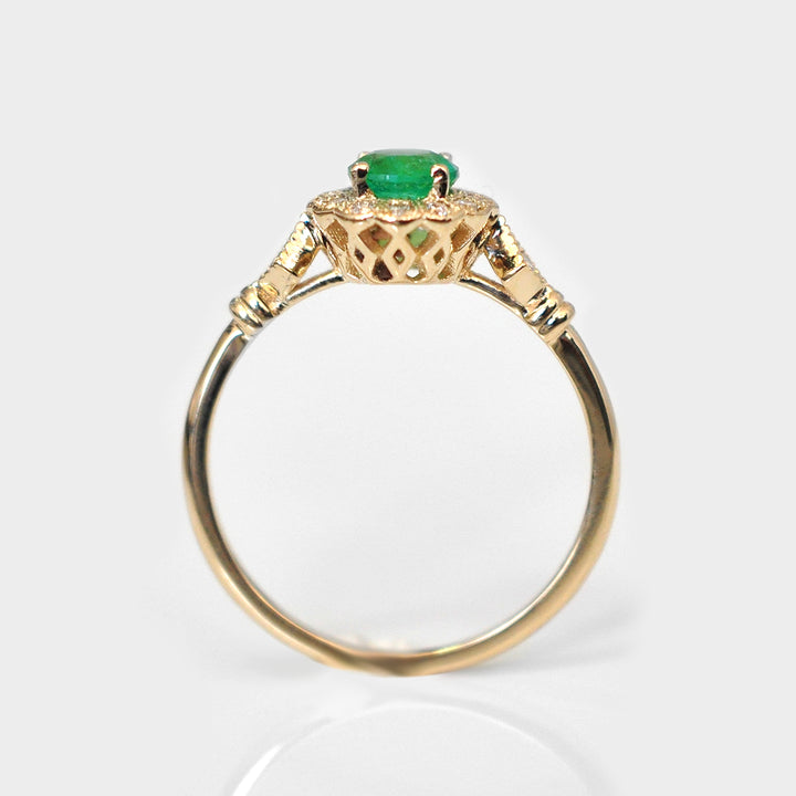 Green Round Cut Emerald and Diamonds Ring