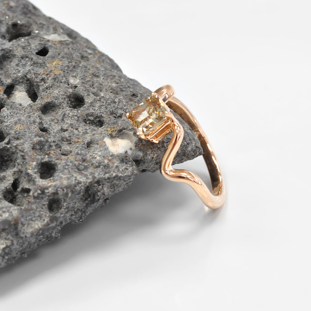 Rose gold twisted shank diamond engagement ring