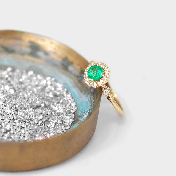 Green Round Cut Emerald and Diamonds Ring