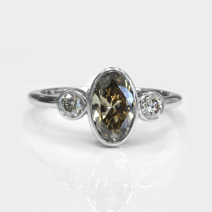 Bezel Set Three Stones Oval &amp; round diamonds Ring