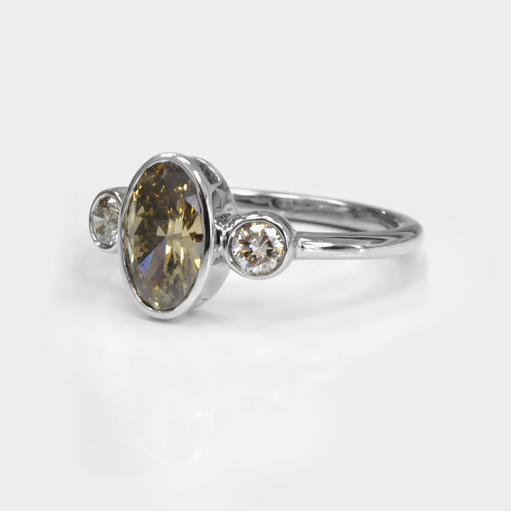 Bezel Set Three Stones Oval &amp; round diamonds Ring