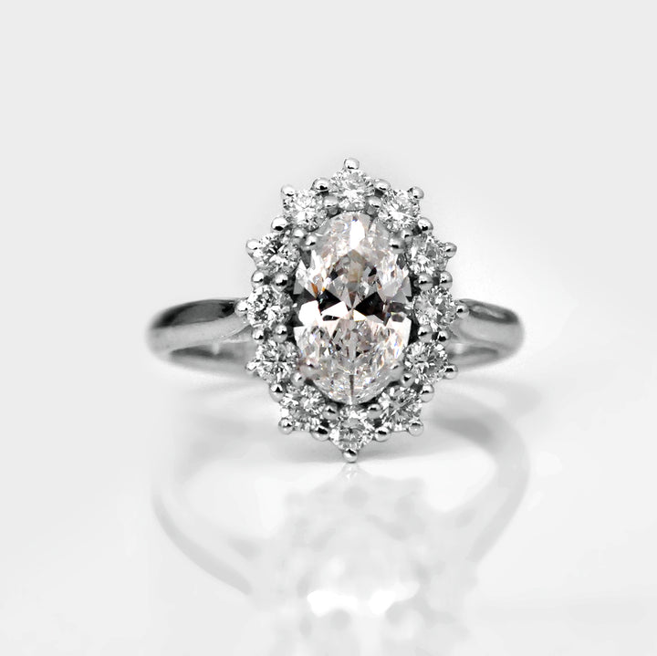 White gold Oval Diamond halo engagement ring
