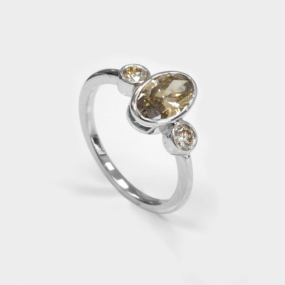 Bezel Set Three Stones Oval &amp; round diamonds Ring