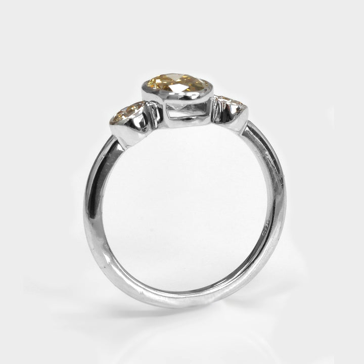 Bezel Set Three Stones Oval &amp; round diamonds Ring