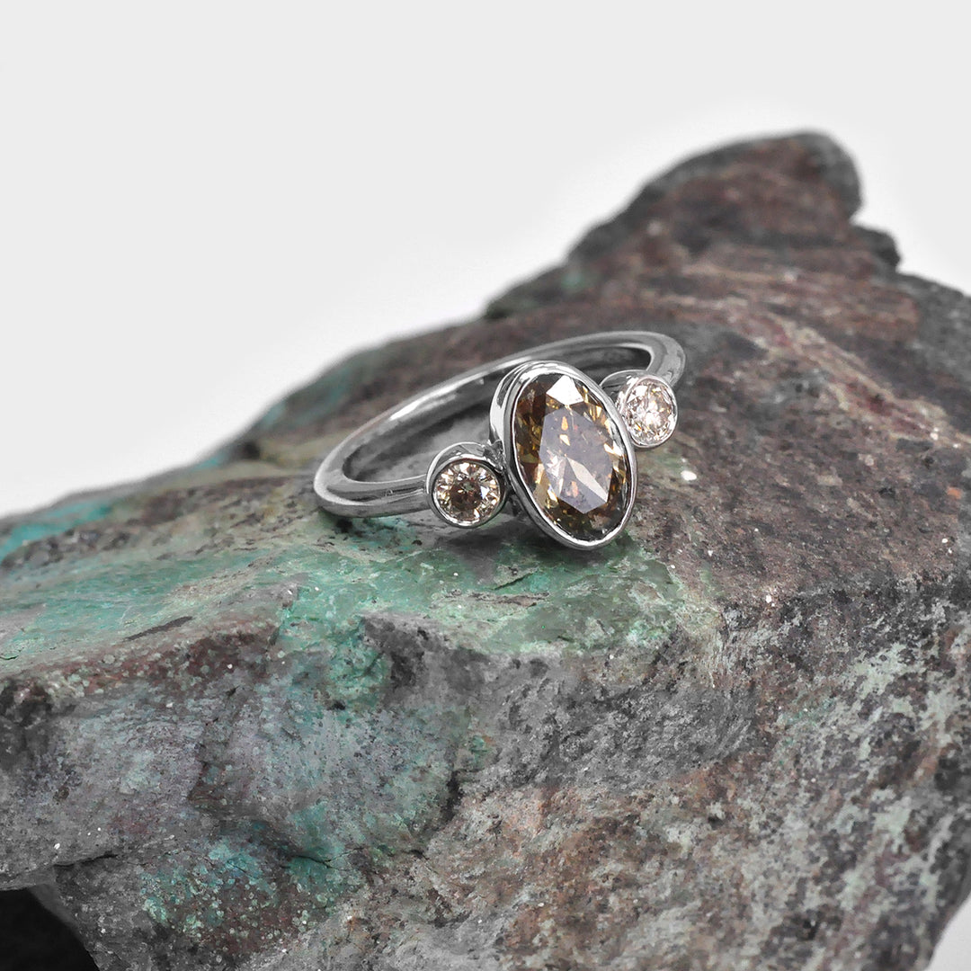 Bezel Set Three Stones Oval &amp; round diamonds Ring