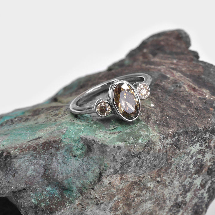 Bezel Set Three Stones Oval &amp; round diamonds Ring