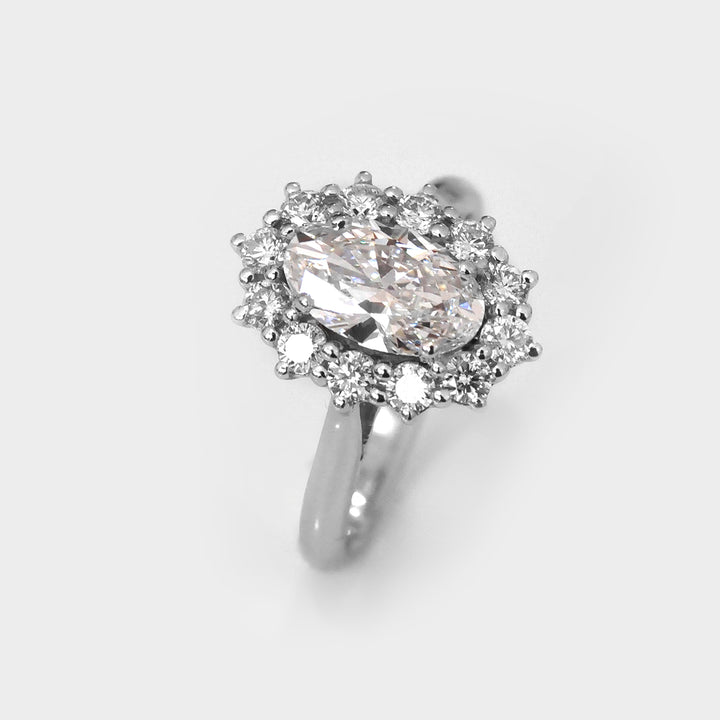 White gold Oval Diamond halo engagement ring
