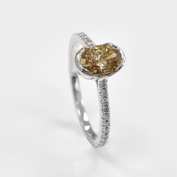 Oval Yellowish Brown half Bezel Setting Diamonds Ring