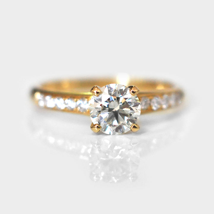 White Round Diamond Ring and Side Diamonds