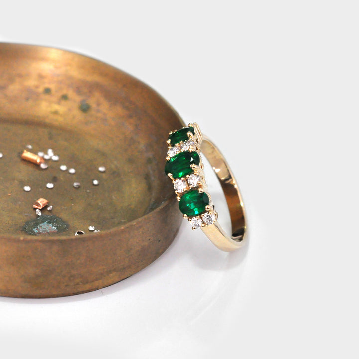 3 Stone Emeralds and Side Diamonds Ring