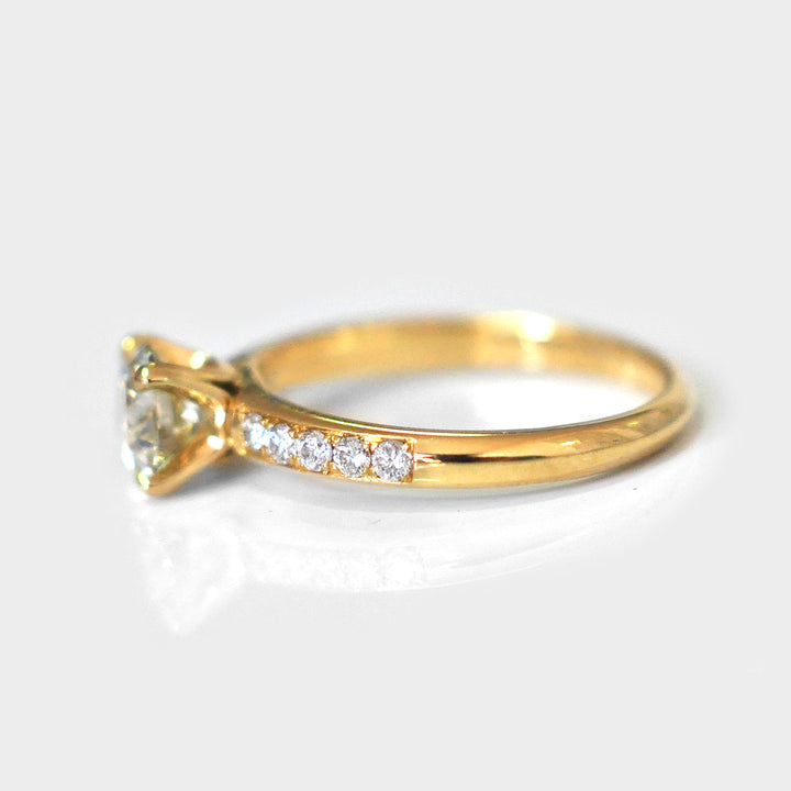 White Round Diamond Ring and Side Diamonds