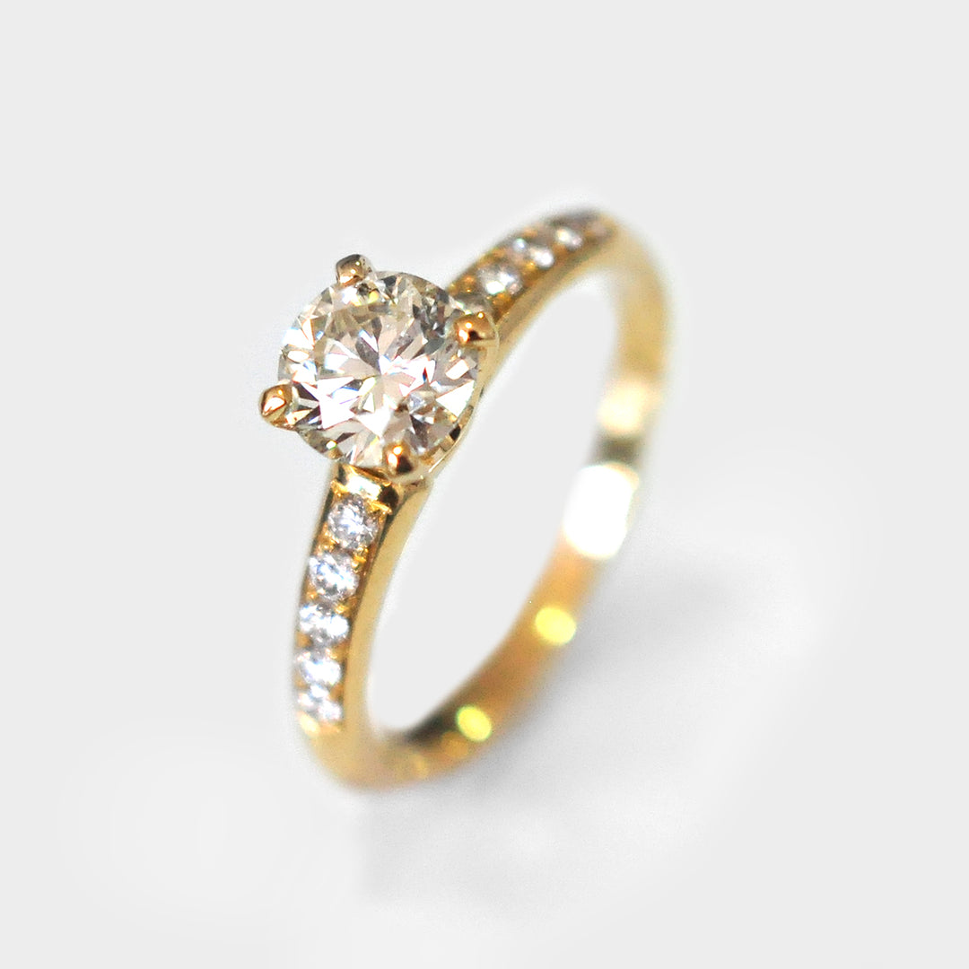 White Round Diamond Ring and Side Diamonds