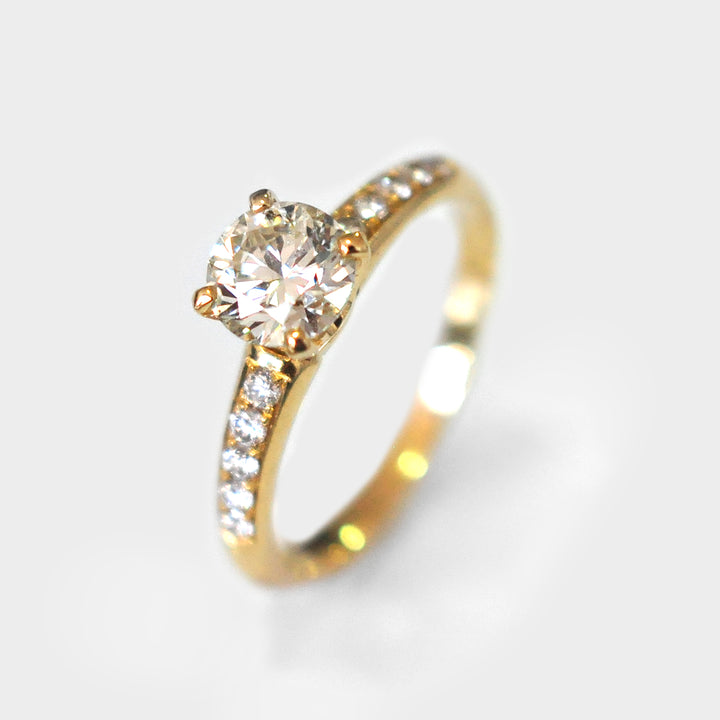 White Round Diamond Ring and Side Diamonds