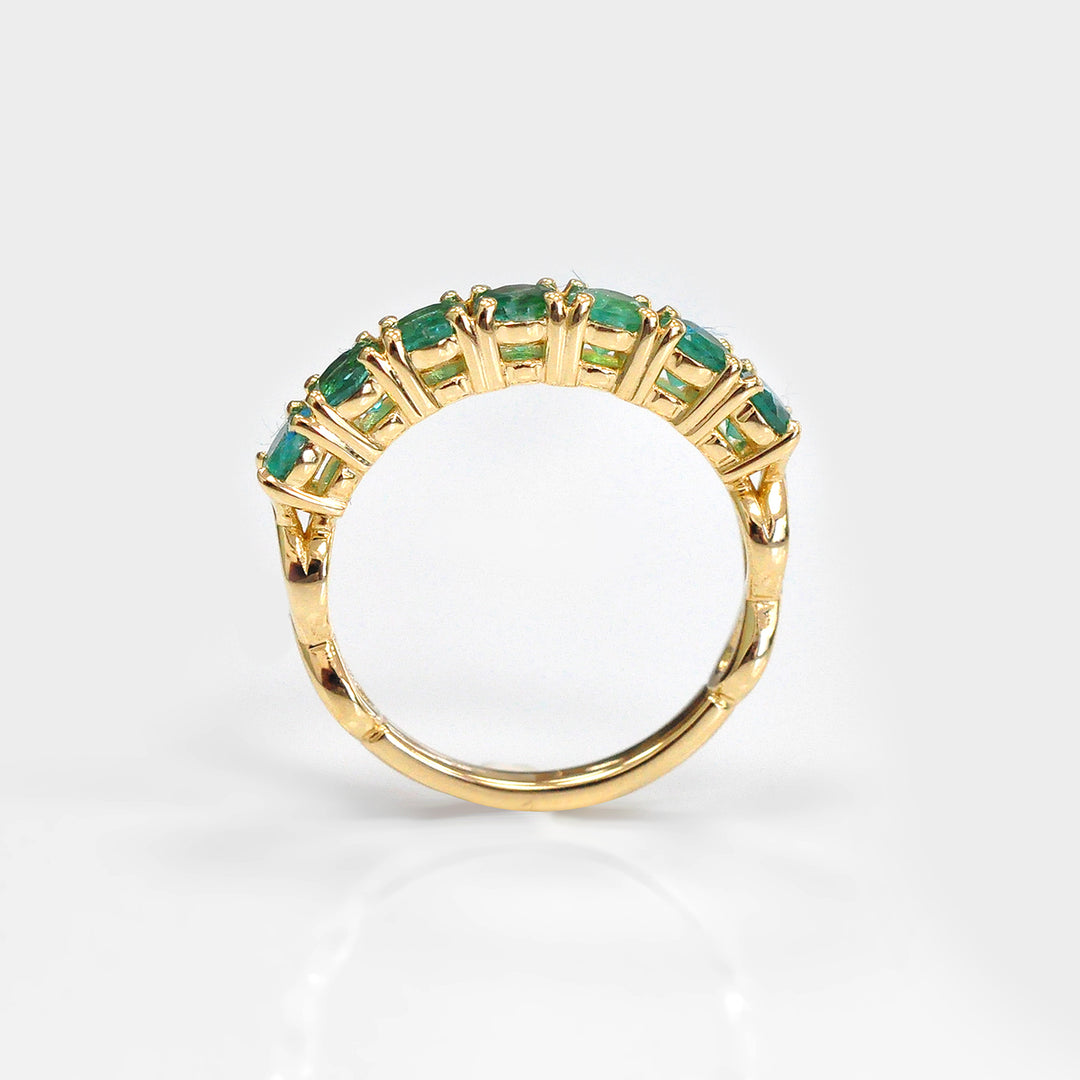Seven Round Emeralds Ring in Yellow Gold