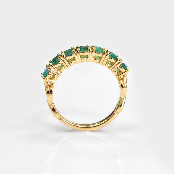 Seven Round Emeralds Ring in Yellow Gold