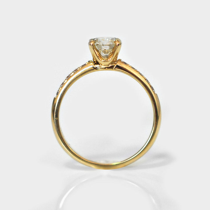 White Round Diamond Ring and Side Diamonds