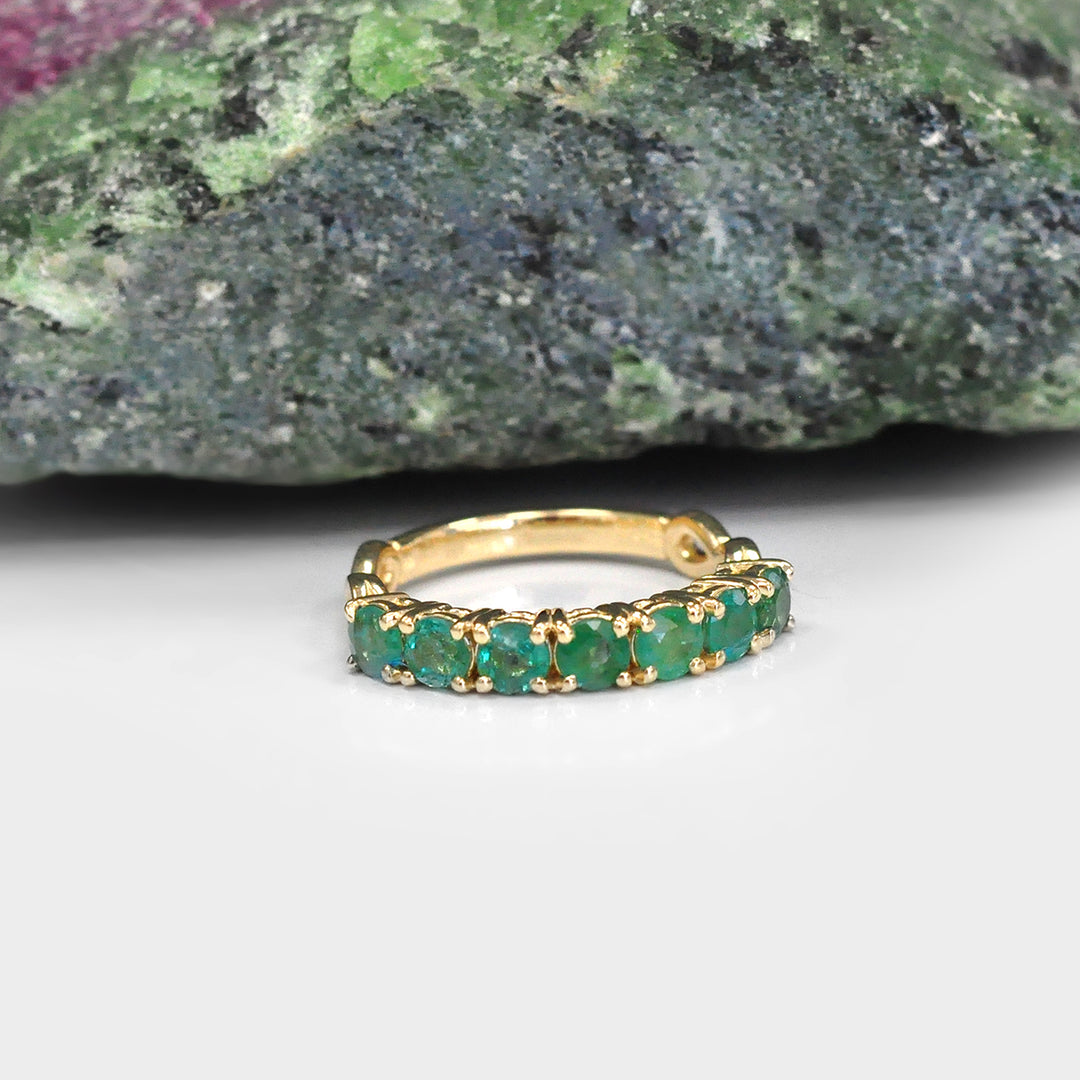 Seven Round Emeralds Ring in Yellow Gold