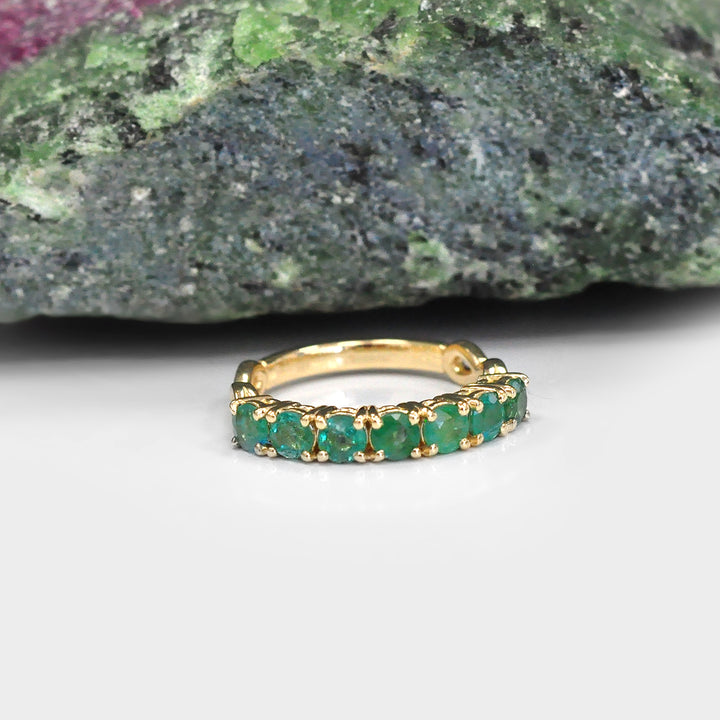 Seven Round Emeralds Ring in Yellow Gold