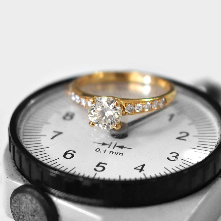 White Round Diamond Ring and Side Diamonds