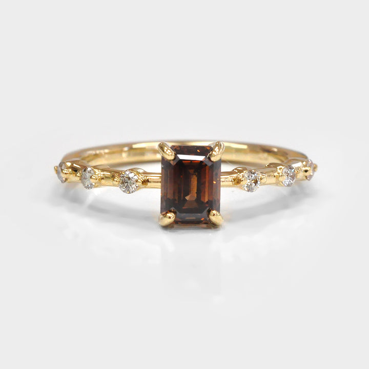 Delicate Emerald cut Diamond and 6 Side Diamonds Ring