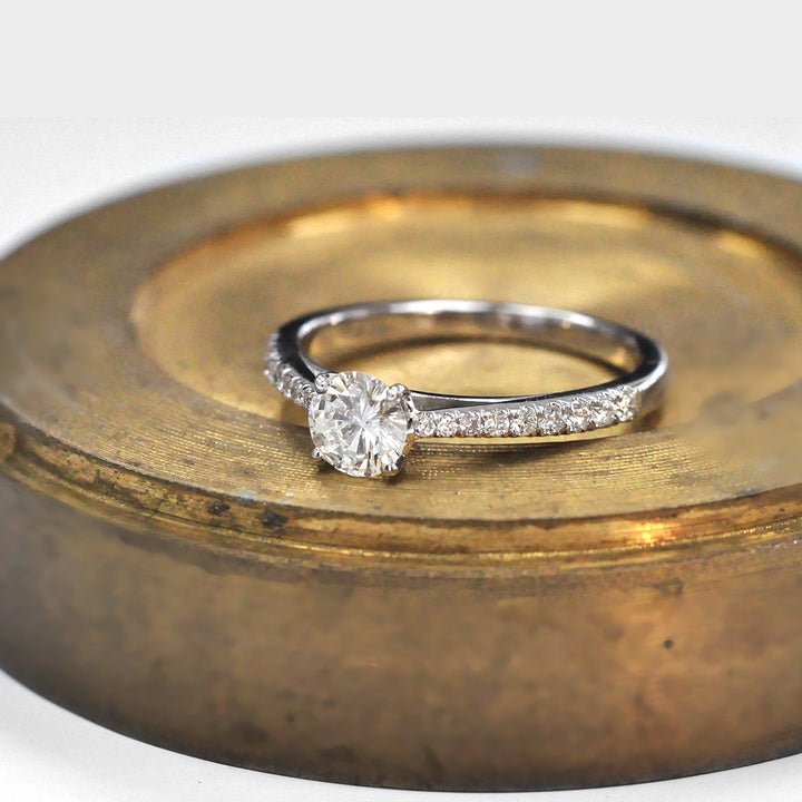 classic side stones elevated shank engagement ring
