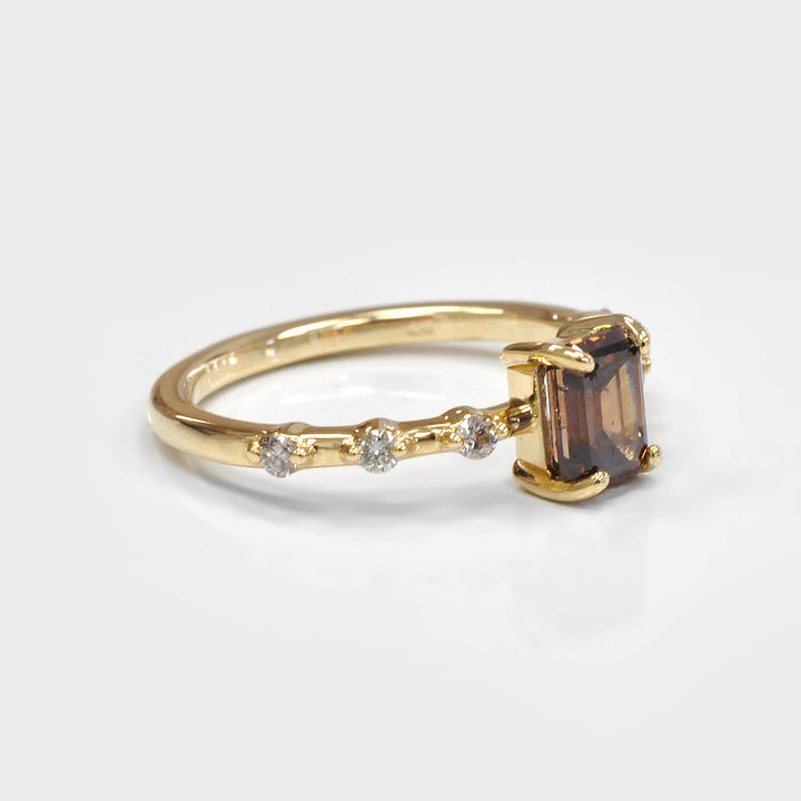 Delicate Emerald cut Diamond and 6 Side Diamonds Ring