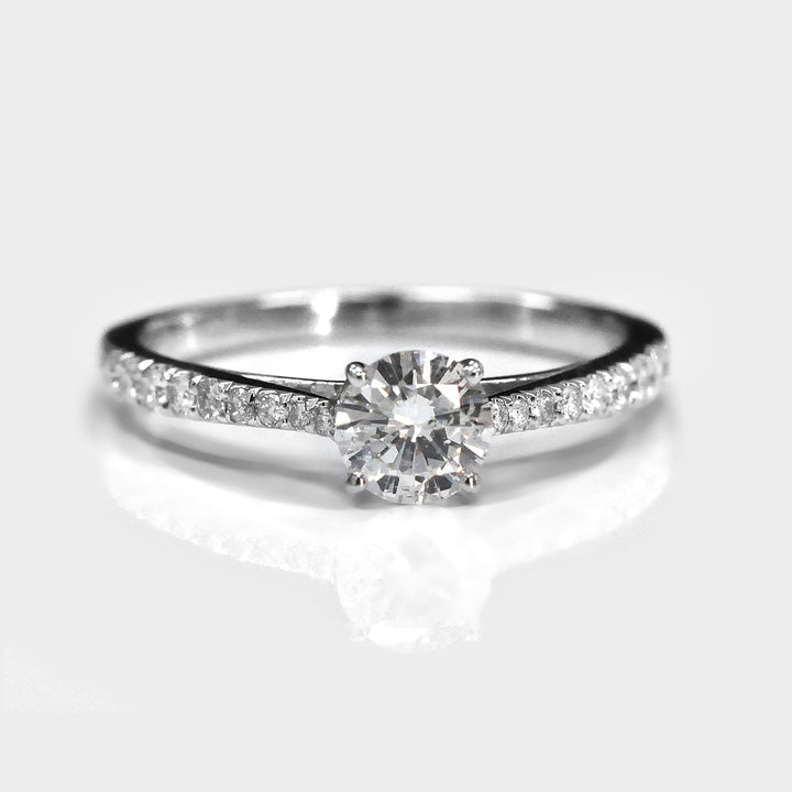 classic side stones elevated shank engagement ring